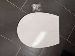 Siège de WC amovible avec frein neuf 