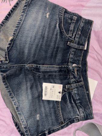 Short en jean bleu style usé taille 36 neuf avec étiquette