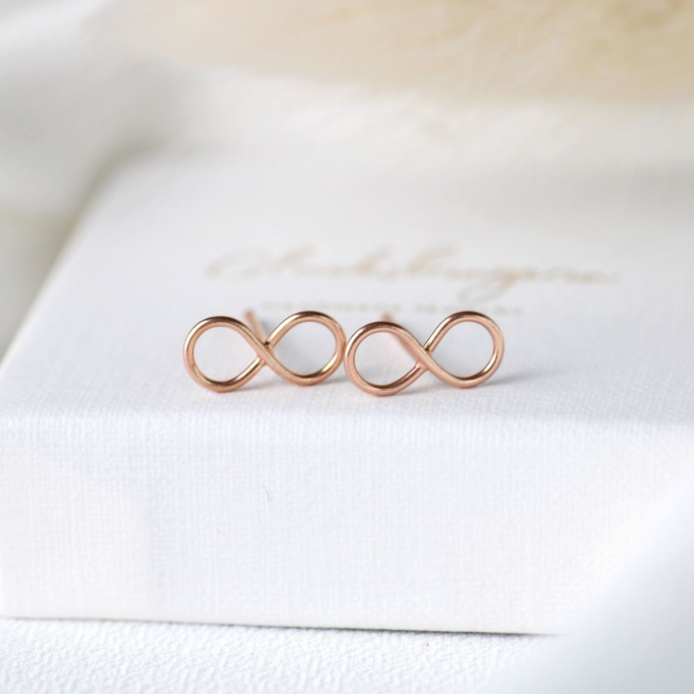 Orecchini pendenti & Orecchini a lobo: Infinity Ohrringe 925 Silber rosévergoldet – Nuovo e nell'imballaggio originale da Stallikon venduto da Bergli18 2