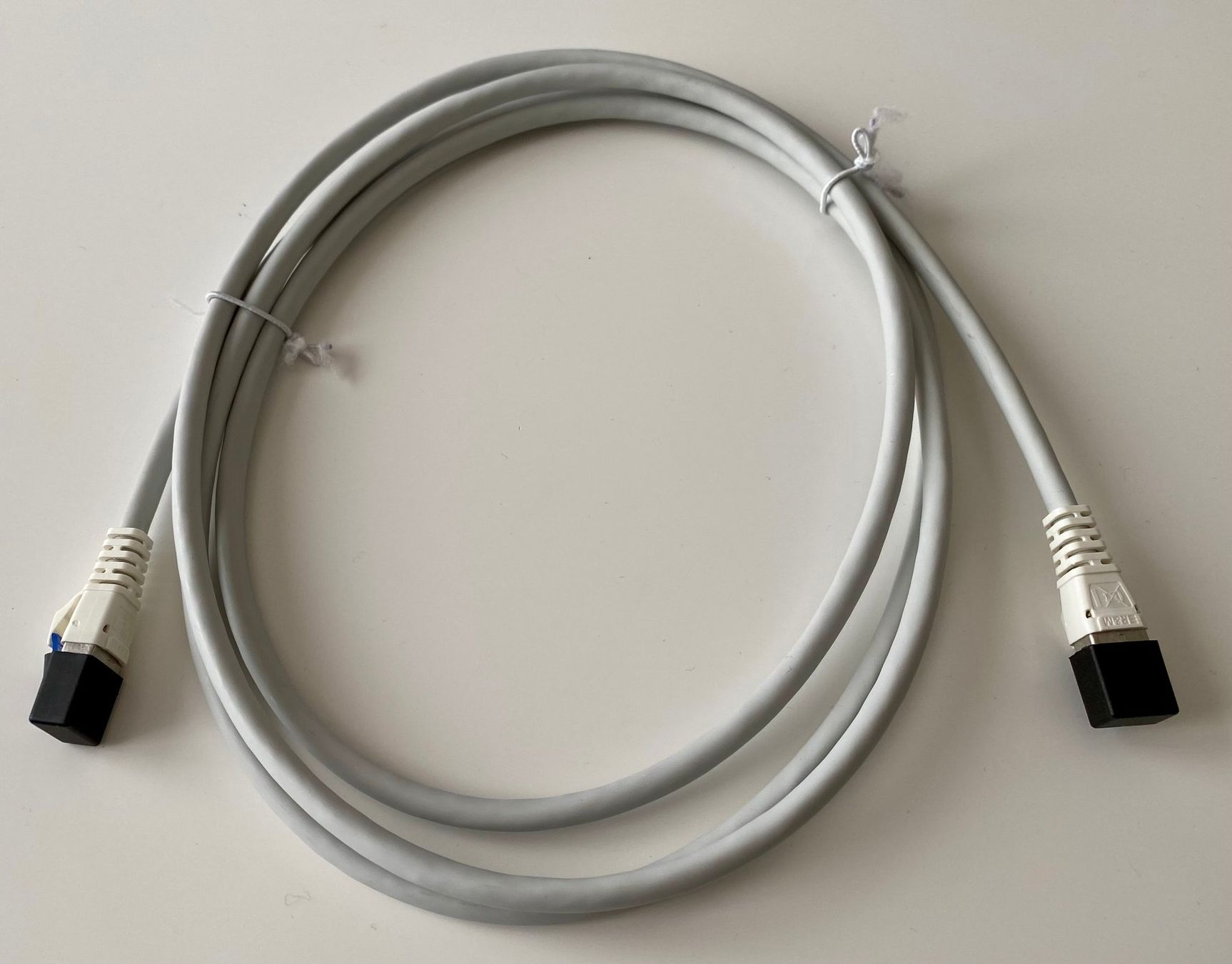 Kabel: Câble patch RJ45s R&M 2m gris S-FTP cat.6 LSFRZH classe E – Neu und originalverpackt aus Peseux von Gilloss
