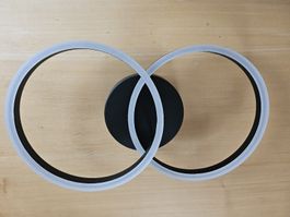 LED Wandlampe, schwarz mit weißen Ringen, neu