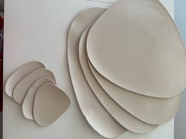 Set of 4 beige placemats and coasters
