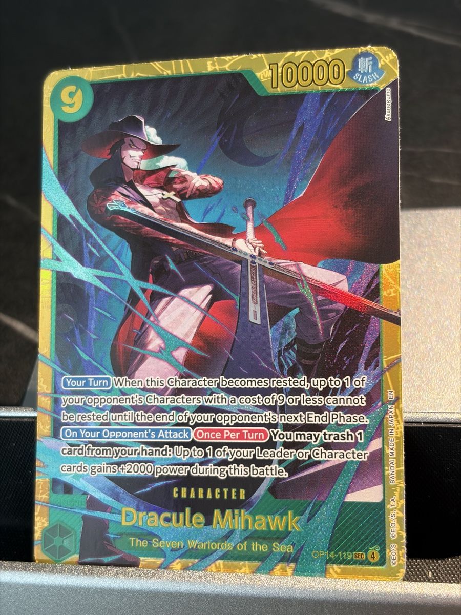 Bandai Carte collezionabili: One Piece OP14-119 Dracule Mihawk, Englisch – Nuovo (secondo la descrizione) da St. Gallen venduto da cambitcg