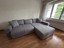 Ecksofa mit Stauraum und Schlaffunktion