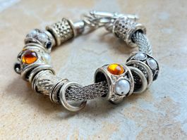 ARMBAND orange-schwarz