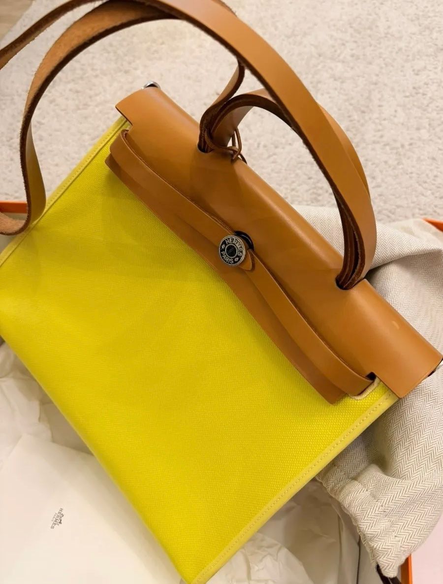 Hermès Taschen für Damen: Hermès "Herbag" Tasche, gelb/braun – Neu (gemäss Beschreibung) aus Triesen von dardaleni 1