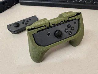 Nintendo Giochi: Ergonomische Joycon Griff Nintendo Switch – Nuovo e nell'imballaggio originale da Dietikon venduto da You_Want_We_Print 2