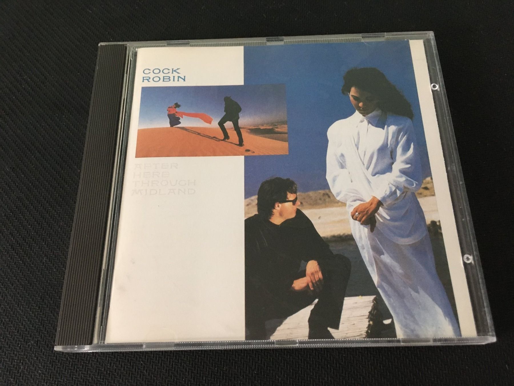 CD: Cock Robin - After here through midland -CD- – Usato da St.Gallen venduto da MedienJoe