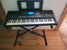 Clavier Yamaha PSR-E433 avec support bon état