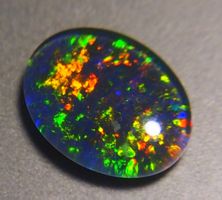 5,5 CTS QUALITY STUNNING BLACKOPAL TRIPLETTE,