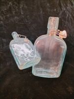 2 Glas Flaschen à 0,6 Liter (zusammen CHF 1.-)
