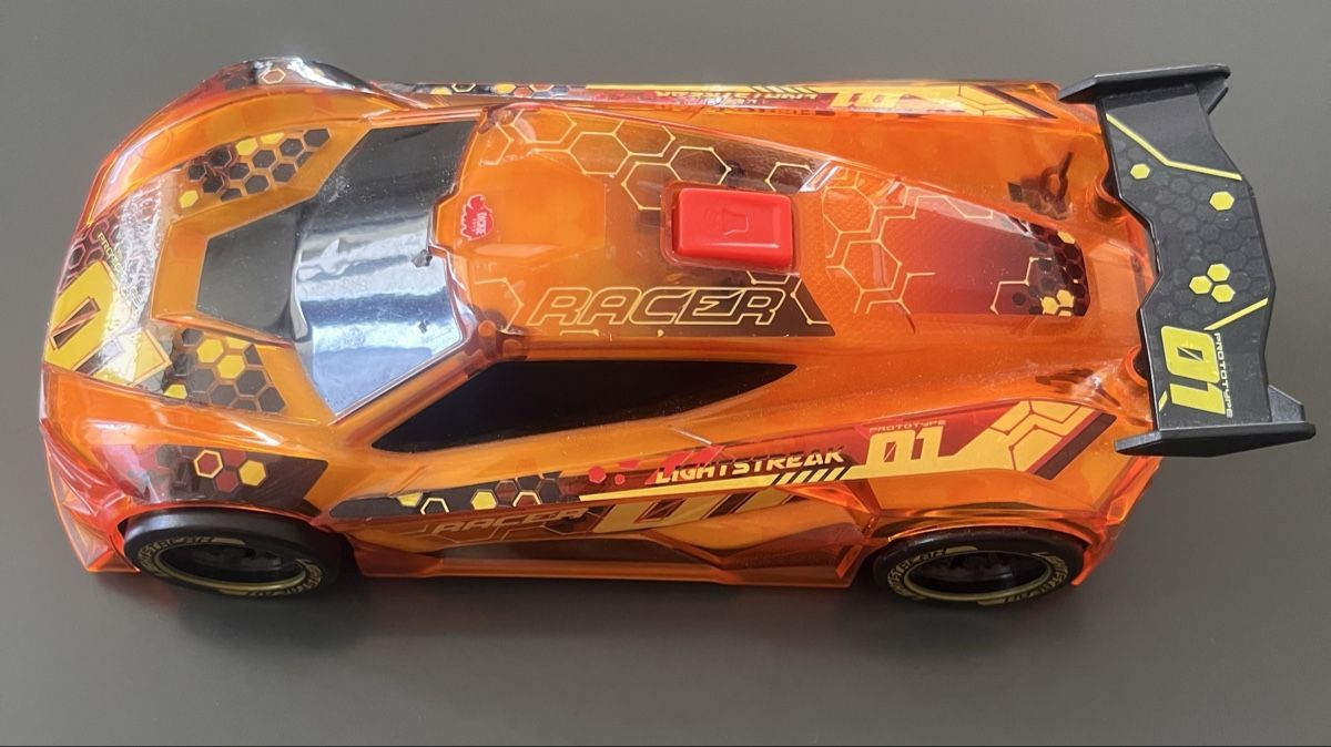 Jouets: Spielzeugauto orange – D'occasion à Uster par SAM0406 1
