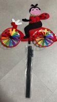 Gartenstecker Marienkäfer auf Velo, Windrad