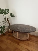 Magnifique table basse ovale marbre fossiles