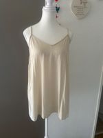Top mit Spaghettiträger beige