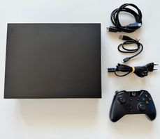 Console Microsoft Xbox One X noire avec manette incluse