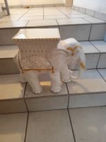 Blumen Hocker