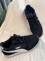 Puma Turnschuh / Sneaker Gr. 38.5 schwarz wiess