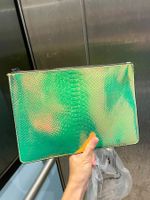 Vendo pochette particolare / fluorescente