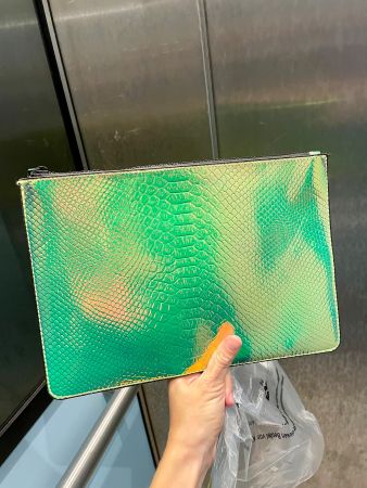Vendo pochette particolare / fluorescente