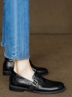 Mocassins noires à boucle, taille 38