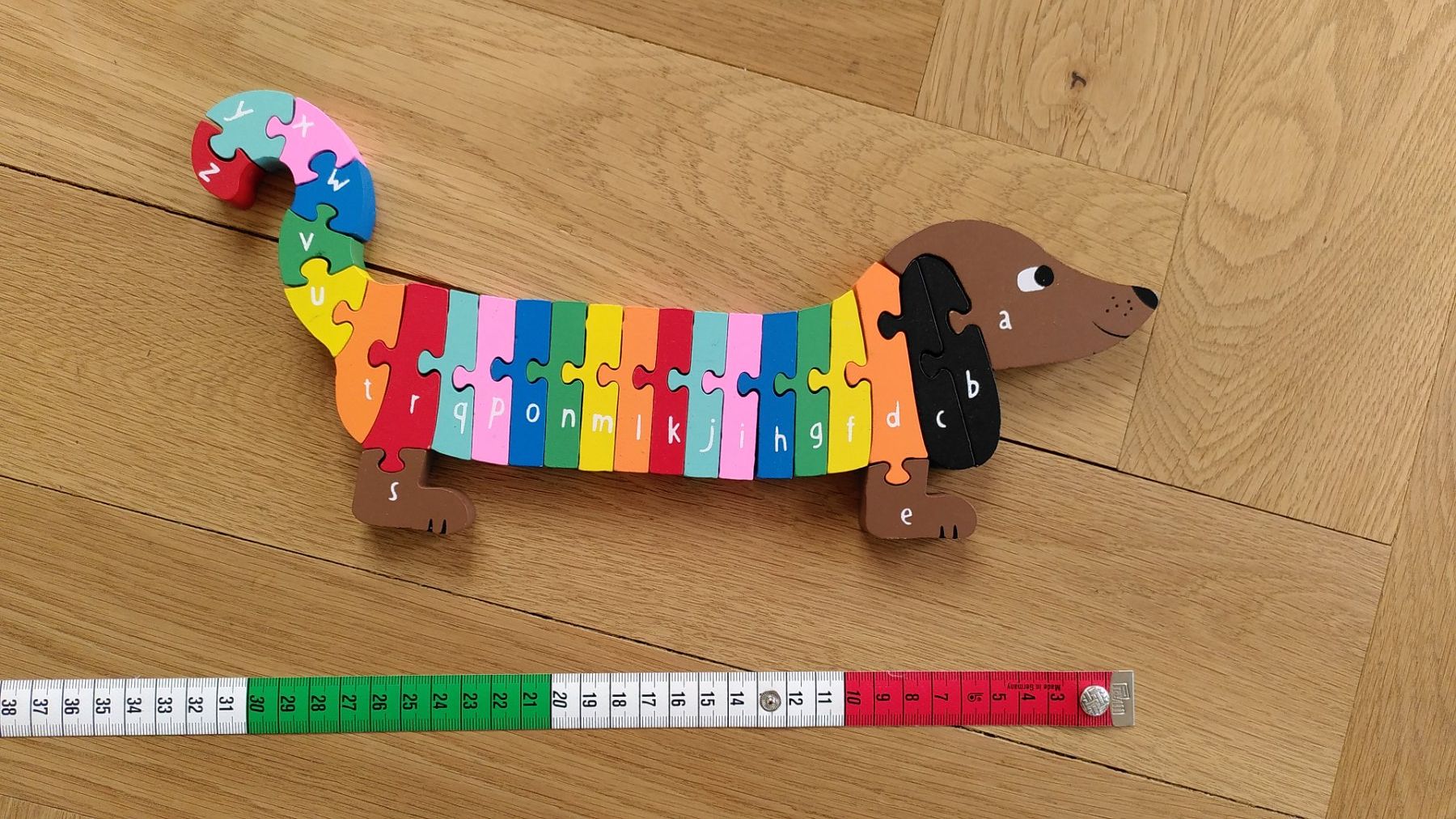Puzzles: Holzpuzzle Dackel mit ABC – Gebraucht aus Zürich von Weluma 1