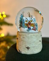 Schneekugel mit Beleuchtung und Musik