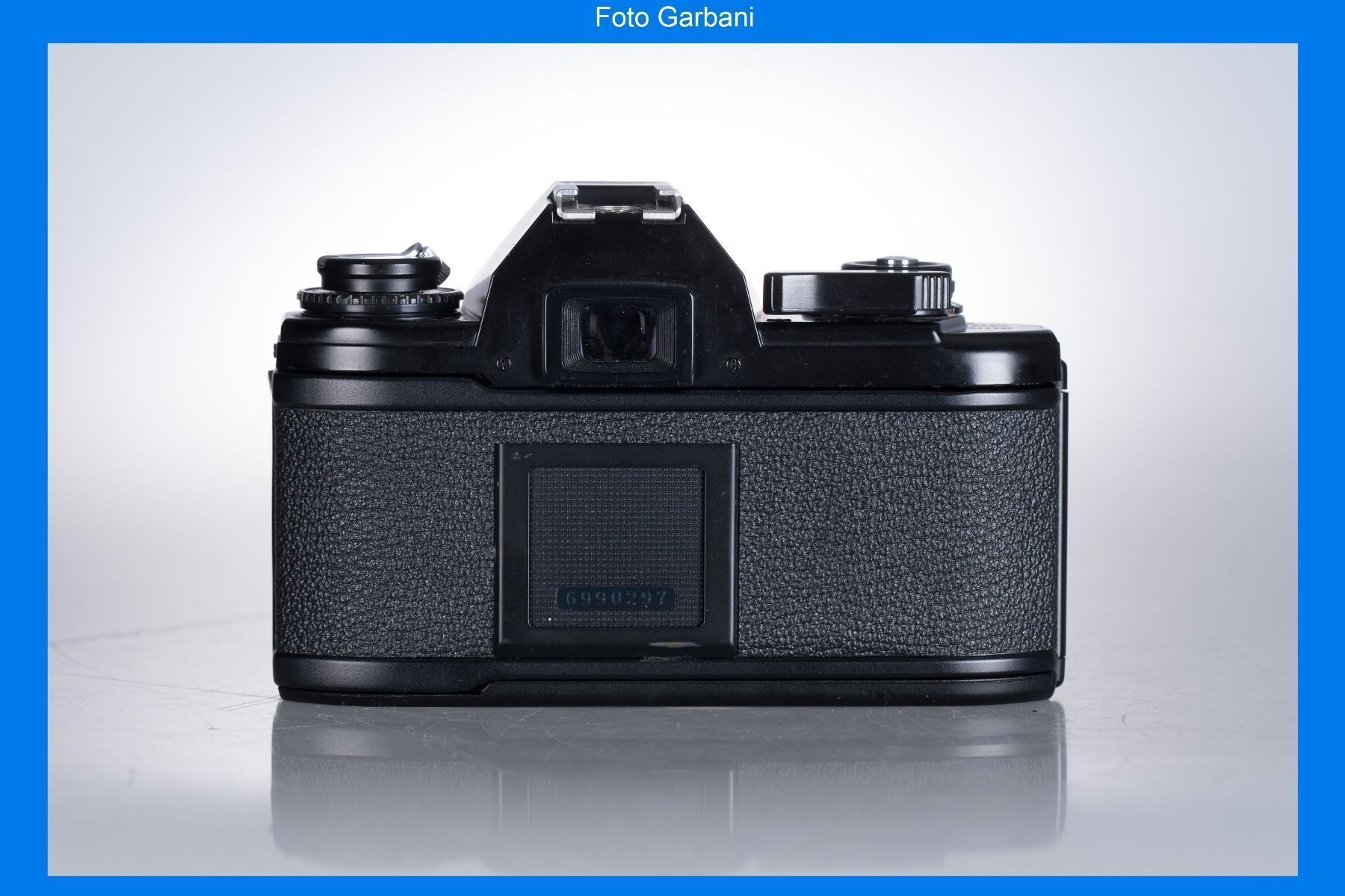 Nikon Fotocamera: Nikon EM + 36-72mm f/3.5 – Usato da Muralto venduto da FotoGarbani 1
