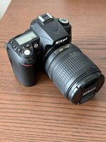 Nikon D90 + 18-105 mm