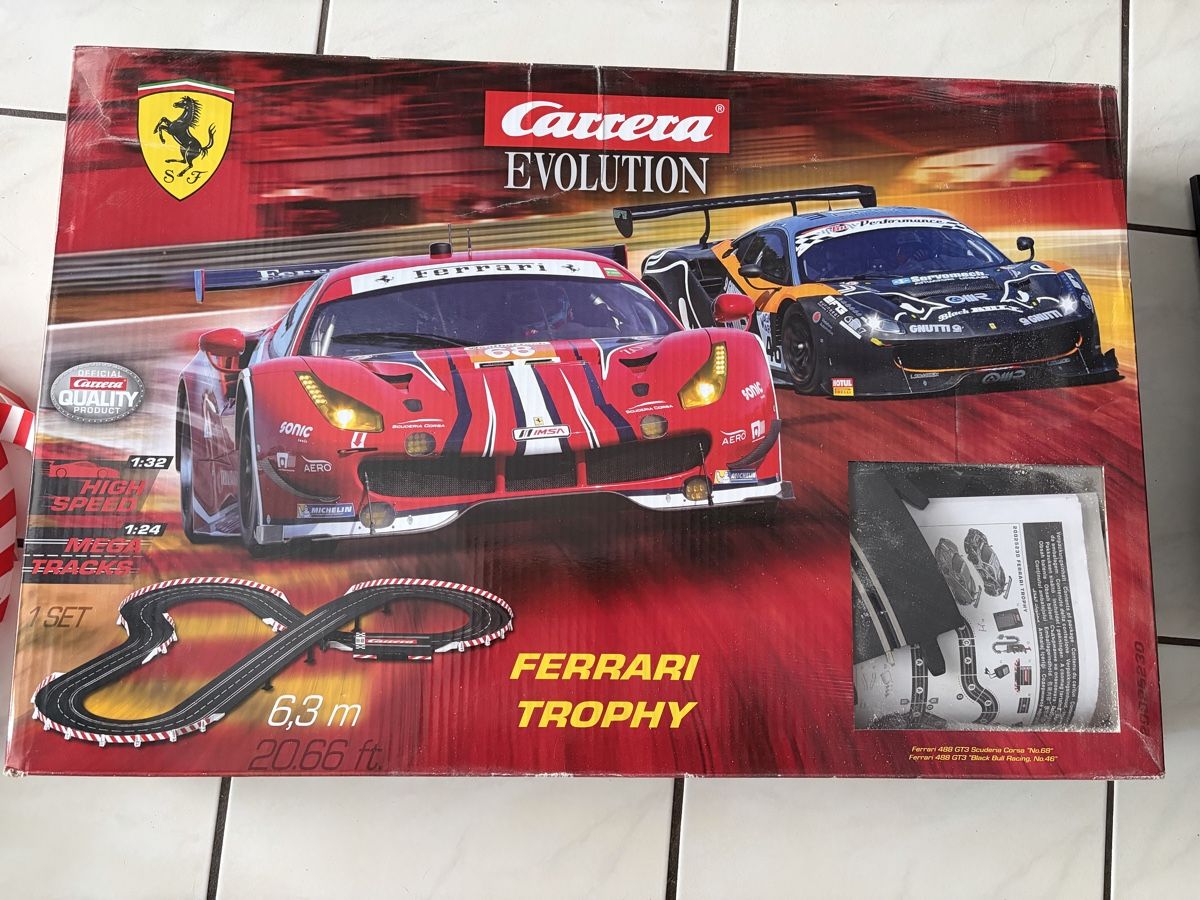 Carrera Rennbahnen: Carrera Evolution Ferrari Trophy (mit Zusatzteilen) – Gebraucht aus Birrwil von Kiramau1974