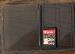 Jeu Nintendo Switch Zelda, et pochette bon état