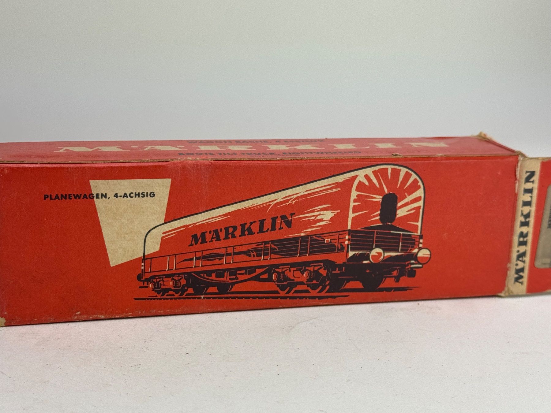 Märklin Modellini di ferrovie: EX-  Märklin Flachbordwagen mit Plane 4517 – Usato da Elm venduto da Wikmtz 3