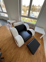 Design-Relaxsessel in Schwarz-Weiss mit Fussteil