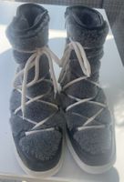 Kandahar schwarze Winterstiefel mit Lammfellfutter Gr. 38.5