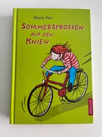 Sommersprossen auf den Knien