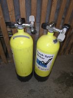 2 Unterwasserzylinder (10 gelbe Liter) mit gebrauchten Wasse