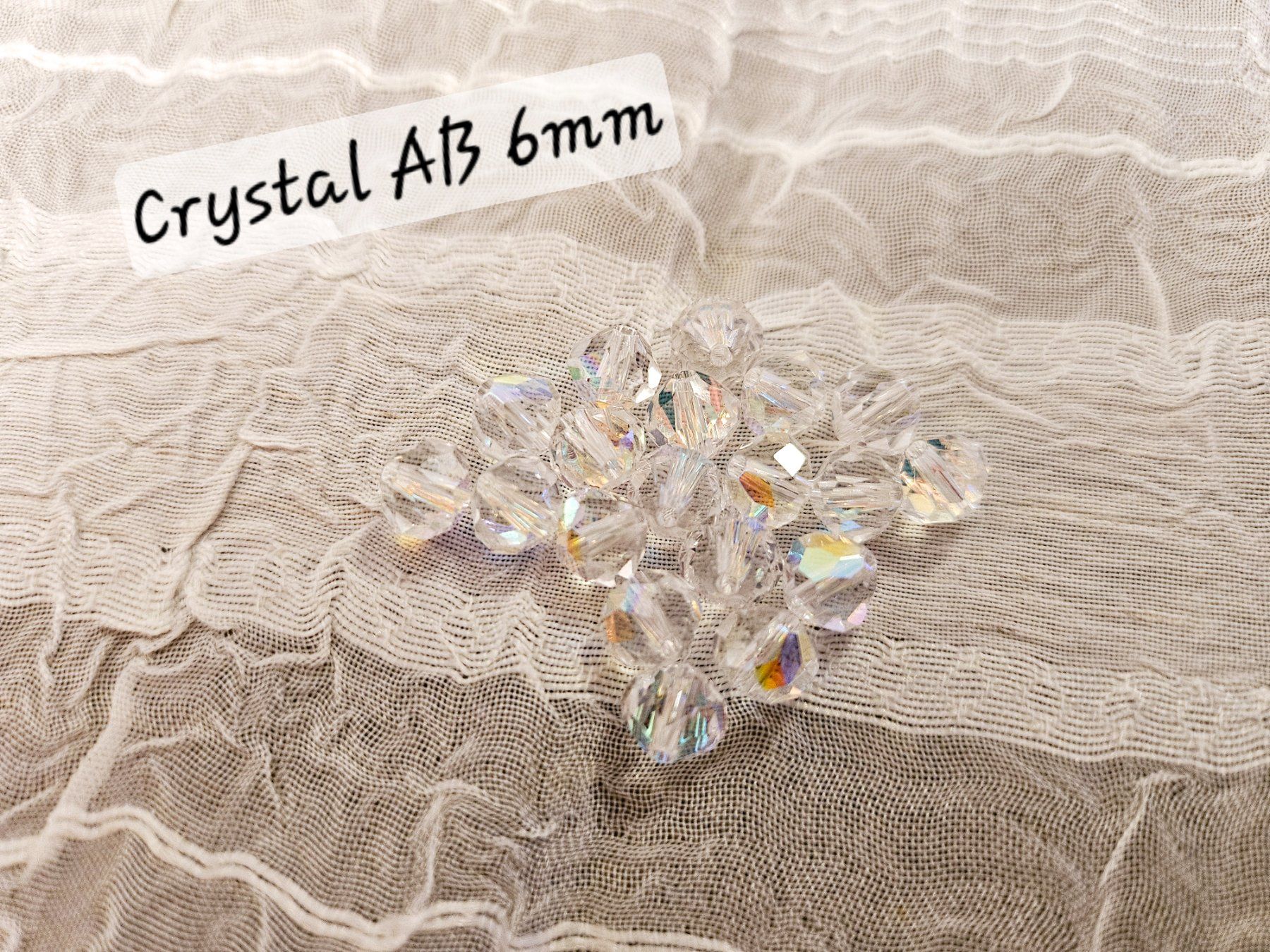 Perle (finte): Swarovski Perlen Crystal AB 6mm – Nuovo e nell'imballaggio originale da Dietikon venduto da Eleda