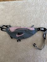 Sac banane Nike gris et rose logo Air
