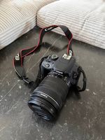 Canon EOS 100D + EF-S 18-135mm 1 IS STM