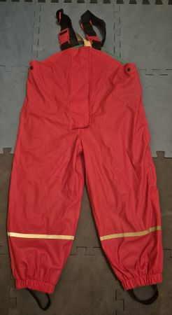 Salopette de pluie rose avec bandes réfléchissantes enfant. 