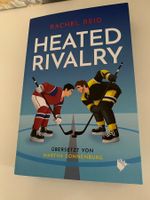 Buch "Heated Rivalry" von Rachel Reid mit Farbschnitt