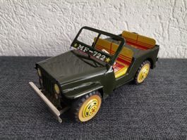 Jeep militaire vintage Tin Toy à friction