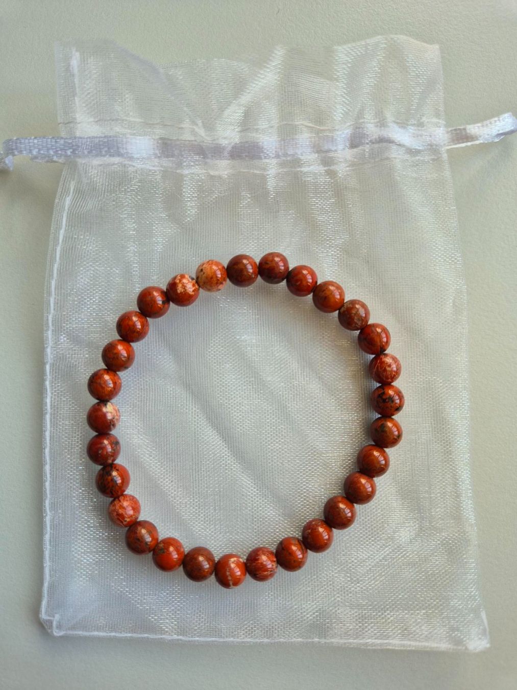 Bracciali & Braccialetti: Roter Jaspis Armband 6mm – Nuovo e nell'imballaggio originale da Rüti ZH venduto da pep_l9zp
