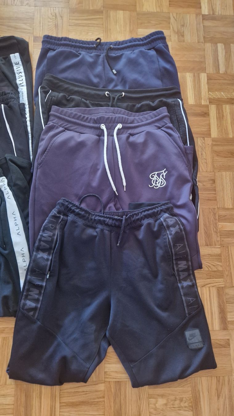 Lotti di vestiti: 7 trainers taille L  – Usato da Tolochenaz venduto da Romadom 1