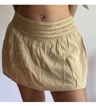 Minirock beige mit Pailletten
