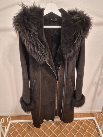Wintermantel Lammfell und Racoon Pelz
