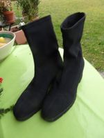 Schicke schwarze Stiefeletten