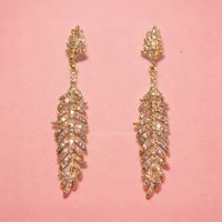 Boucles d’oreilles Plume Dorée