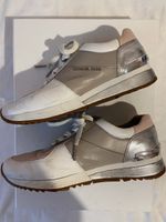 Baskets Michael Kors roses et blanches