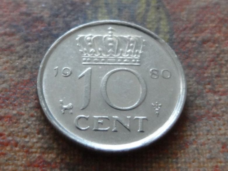 Tutti le monete: PAYS-BAS  Nederland  10  Cent  1980 – Usato da Romanel-sur-Lausanne venduto da Swift13
